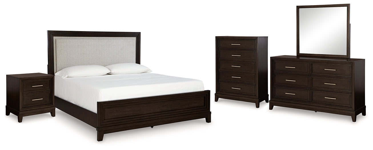 Neymorton California King Upholstered Panel Bed with Mirrored Dresser, Chest and Nightstand